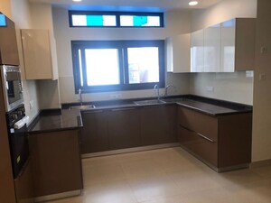 Kitchen in 4 BHK Apartment at Vasant Vihar – for Rent