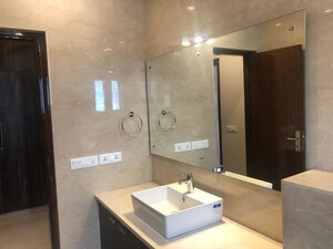 Bathroom in 4 BHK Apartment at Vasant Vihar – for Rent