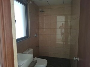 Bathroom in 3 BHK Apartment at Kalpataru Immensa, Kolshet Road – for Rent