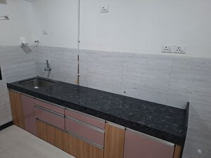 Kitchen in 3 BHK Apartment at Acme Ozone Phase II, Manpada – for Rent