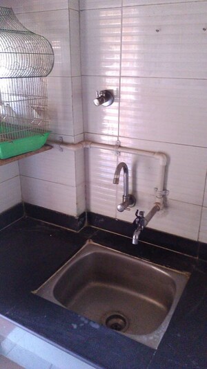 Kitchen in 2 BHK Apartment at Mittal Silver Crescent, Kharadi – for Rent