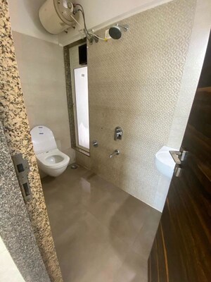 Bathroom in 1 BHK Apartment at Ruparel Elara, Kandivali West – for Rent