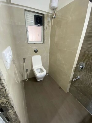 Bathroom in 1 BHK Apartment at Ruparel Elara, Kandivali West – for Sale