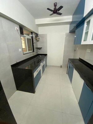 Kitchen in 1 BHK Apartment at Ruparel Elara, Kandivali West – for Sale