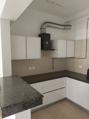 Kitchen in 3.5 BHK Apartment at Microtek Greenburg, Sector 86 – for Rent