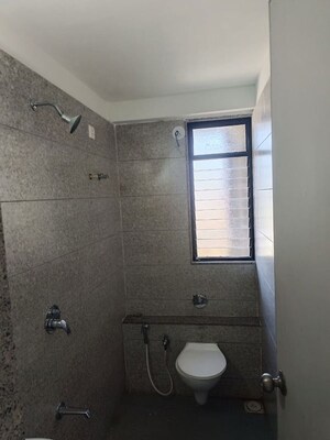 Bathroom in 1.5 BHK Apartment at Sun Rising Homes, Jagatpur – for Rent