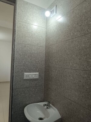 Bathroom in 1.5 BHK Apartment at Sun Rising Homes, Jagatpur – for Rent