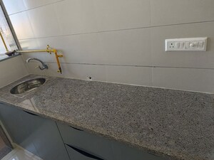 Kitchen in 1.5 BHK Apartment at Sun Rising Homes, Jagatpur – for Rent