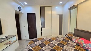 Bedroom in 2 BHK Apartment at Sethia Kalpavruksh Heights, Kandivali West – for Rent