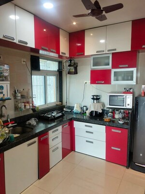 Kitchen in 2 BHK Apartment at Rosa Bella, Ghodbunder Road – for Sale