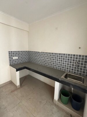 Kitchen in 3 BHK Apartment at Raj Nagar – for Sale