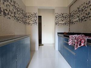 Balcony in 1 BHK Apartment at Unnati Woods CHS, Kasarvadavali – for Rent