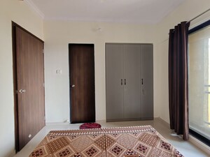 Bedroom in 1 BHK Apartment at Unnati Woods CHS, Kasarvadavali – for Rent