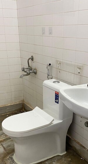 Bathroom in 2 BHK Apartment at AWHO Devinder Vihar, Sector 56 – for Rent