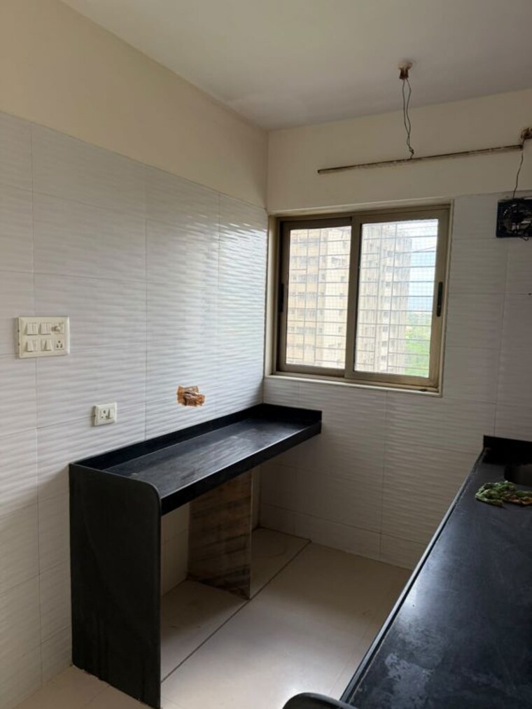 Kitchen, vishesh-balaji-symphony-phase-2 1.5 Bedroom 680 Sq.Ft. Apartment In New Panvel Navi Mumbai 10653021