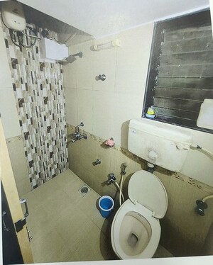 Bathroom in 1 BHK Apartment at Adelphi Apartment, Andheri West – for Rent