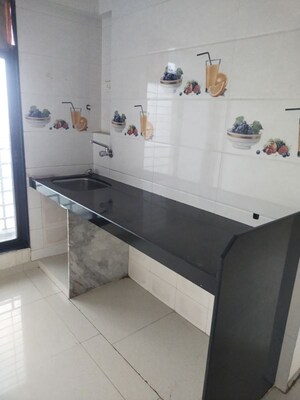 Kitchen in 1 BHK Apartment at Jayshakti Panchmukhi CHS, Karanjade – for Rent