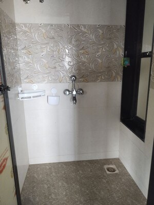 Bathroom in 1 BHK Apartment at Jayshakti Panchmukhi CHS, Karanjade – for Rent