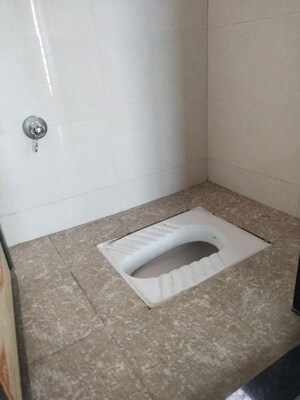 Bathroom in 1 BHK Apartment at Jayshakti Panchmukhi CHS, Karanjade – for Rent