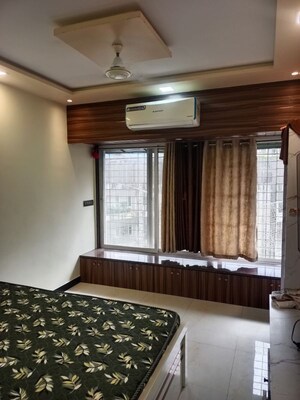 Living Room in 2 BHK Apartment at Royal Palms Garden View, Goregaon East – for Rent