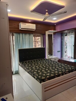 Bedroom in 2 BHK Apartment at Royal Palms Garden View, Goregaon East – for Rent