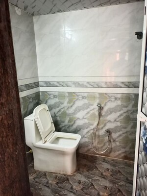 Bathroom in 2 BHK Apartment at Royal Palms Garden View, Goregaon East – for Rent