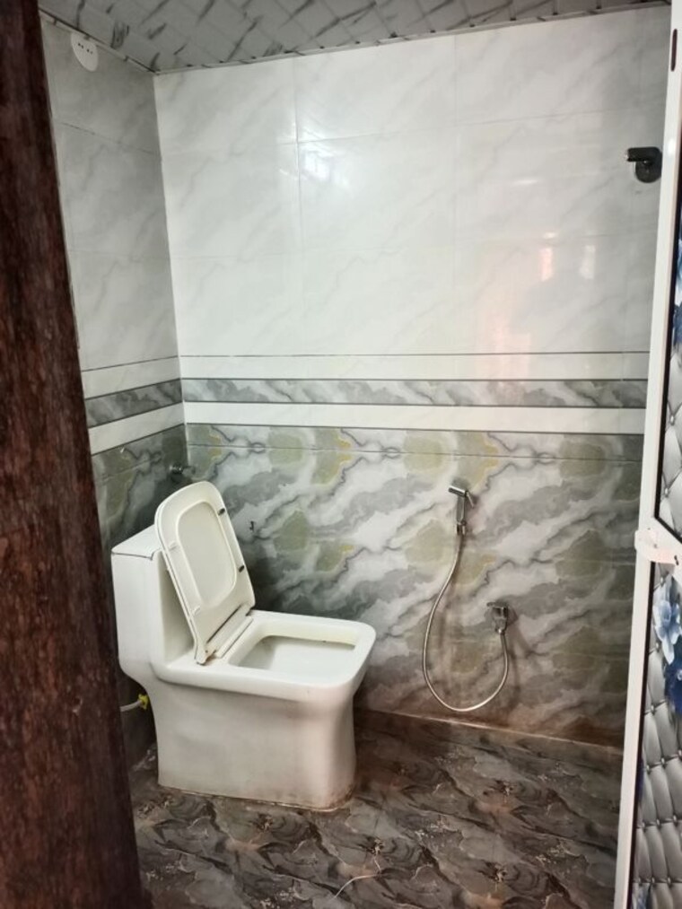 Bathroom, royal-palms-garden-view 2 Bedroom 974 Sq.Ft. Apartment In Goregaon East Mumbai 10653056