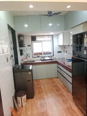 Kitchen in 2 BHK Apartment at Royal Palms Garden View, Goregaon East – for Rent