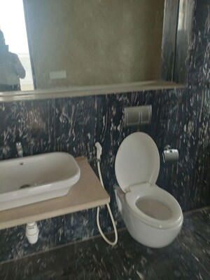 Bathroom in 4 BHK Apartment at Omkar Alta Monte, Malad East – for Rent