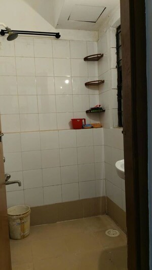 Bathroom in 1 BHK Apartment at Ambuja Neotia Bengal Ambuja Upohar, Garia – for Rent