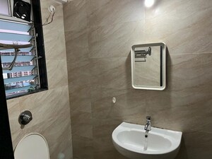 Bathroom in 1 BHK Apartment at Tilak Indrayani, Tilak Nagar – for Rent