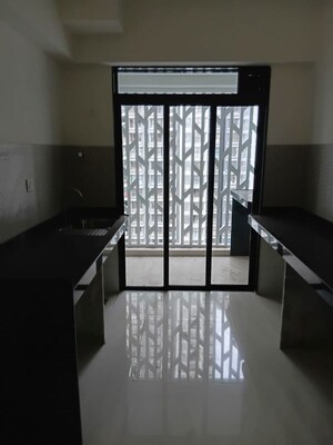 Living Room in 2 BHK Apartment at Lodha Woods, Kandivali East – for Rent