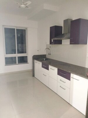 Kitchen in 1 BHK Apartment at Puranik Rumah Bali, Ghodbunder Road – for Sale