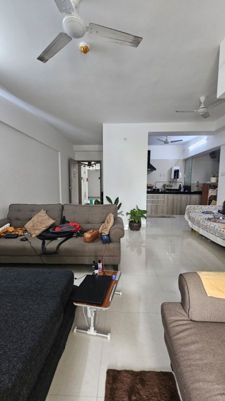 Living Room, shree-venkatesh-graffiti-glover 2 Bedroom 827 Sq.Ft. Apartment In Keshav Nagar Pune 10653210