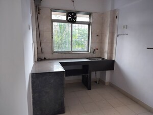 Kitchen in 1 BHK Apartment at Safal Park, Nerul – for Rent