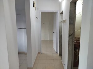 Building Lobby in 1 BHK Apartment at Safal Park, Nerul – for Rent