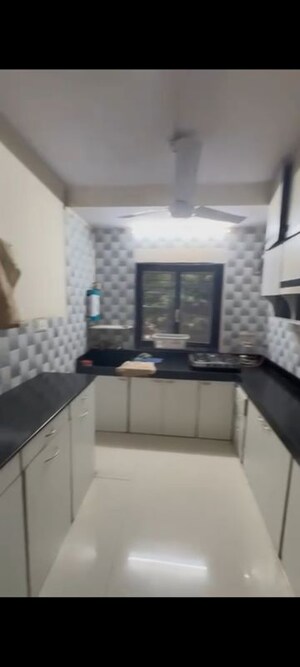 Kitchen in 2 BHK Apartment at Anupam Apartments Vile Parle, Vile Parle West – for Rent