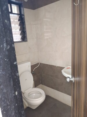 Bathroom in 1 BHK Apartment at GBK Vishwajeet Pink City, Ambernath East – for Rent