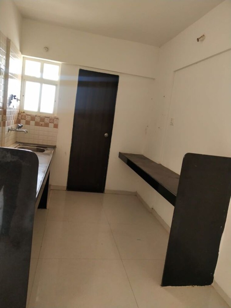 Kitchen, venkatesh-oxy-evolve 1 Bedroom 645 Sq.Ft. Apartment In Wagholi Pune 10653306