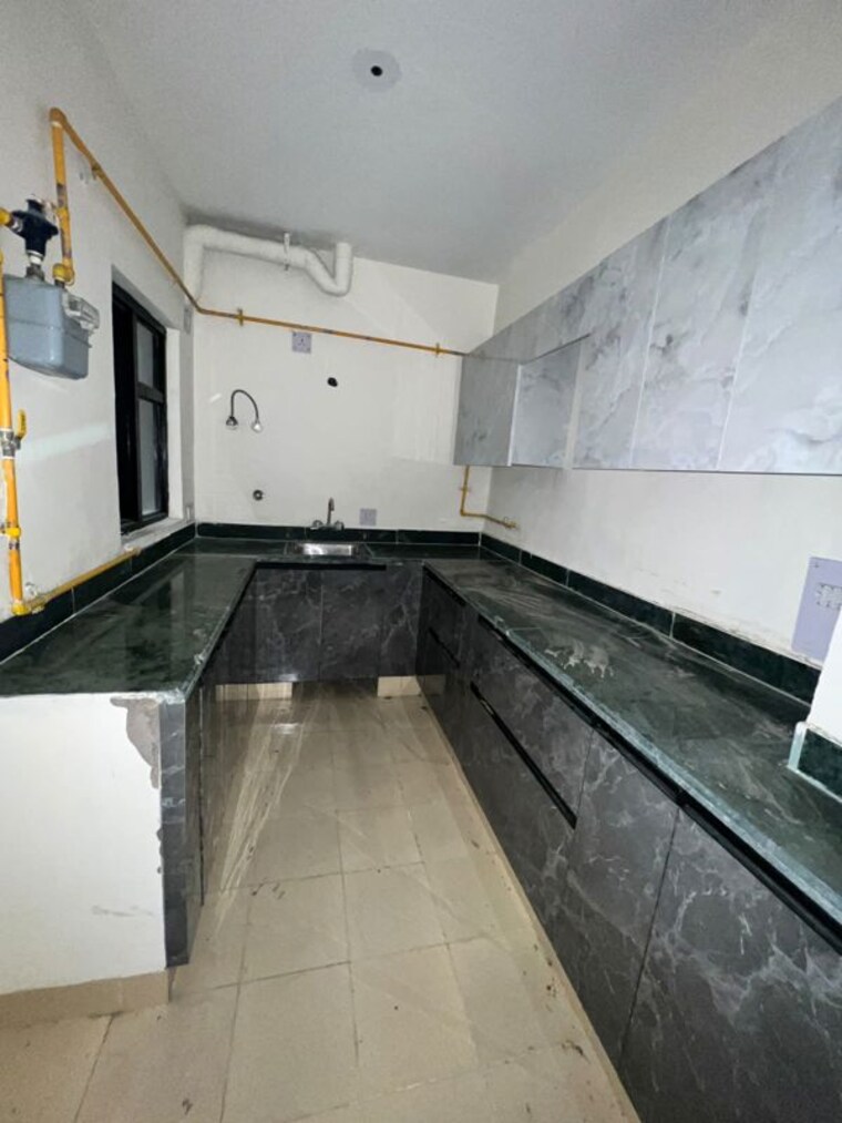 Kitchen, ansal-crown-heights 2 Bedroom 1050 Sq.Ft. Apartment In Sector 80 Faridabad 10653397