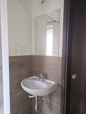 Bathroom in 2 BHK Apartment at Rama Melange Residences, Hinjewadi – for Rent