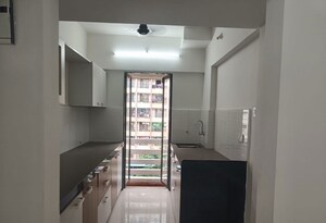 Kitchen in 3 BHK Apartment at Vinay Unique Gardens, Virar West – for Rent