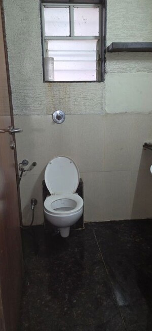 Bathroom in 3 BHK Apartment at Kumar Peninsula, Baner – for Rent