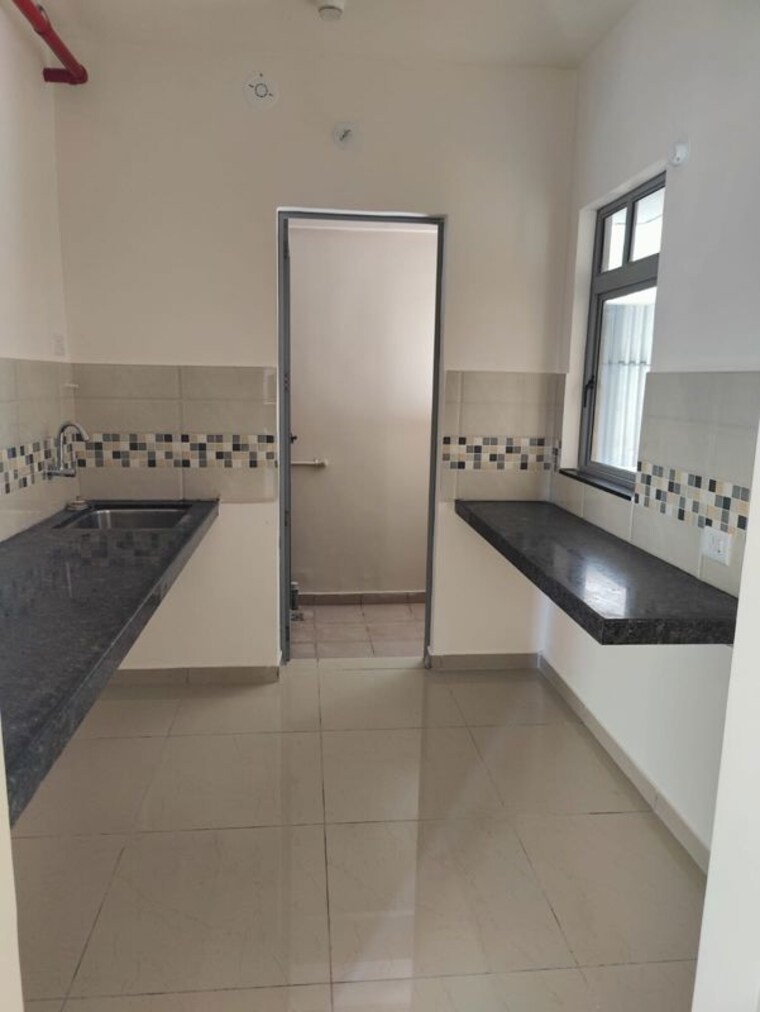 Kitchen, mahindra-happinest-tathawade-phase-1 2 Bedroom 620 Sq.Ft. Apartment In Tathawade Pune 10653613