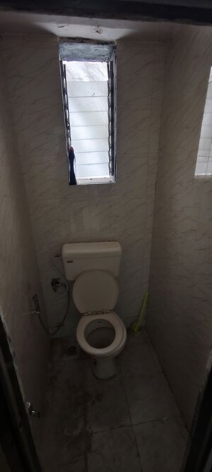 Bathroom in 1 BHK Apartment at Kapasi Niwas CHS, Malad West – for Rent