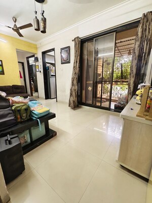 Living Room in 1 BHK Apartment at Nisarg Hyde Park, Kharghar – for Sale