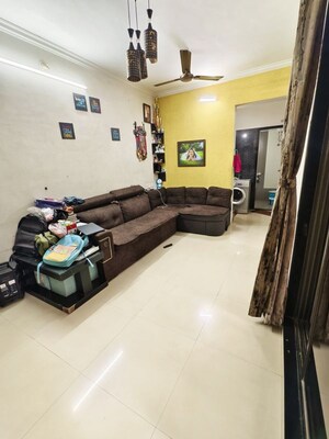 Living Room in 1 BHK Apartment at Nisarg Hyde Park, Kharghar – for Sale