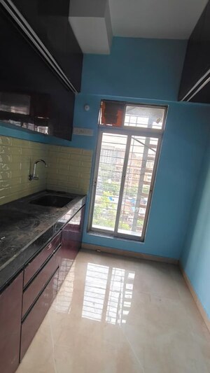 Kitchen in 1 BHK Apartment at Vardhan Heights, Chembur – for Rent
