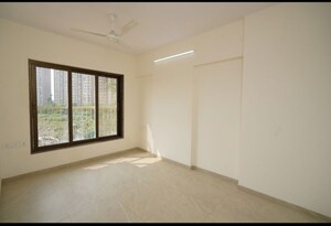 Room in 2 BHK Apartment at Abrol Signature, Malad West – for Sale