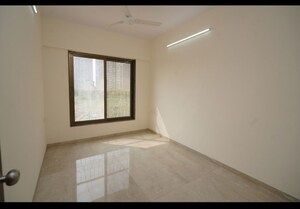 Room in 2 BHK Apartment at Abrol Signature, Malad West – for Sale